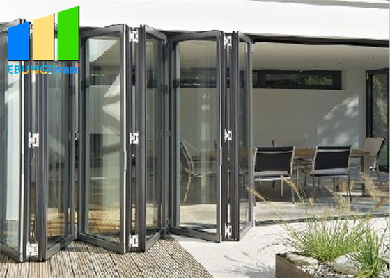 Puerta de plegamiento exterior del patio de cristal de aluminio del acordeón de la puerta del doblez del BI de la doble vidriera Lowes